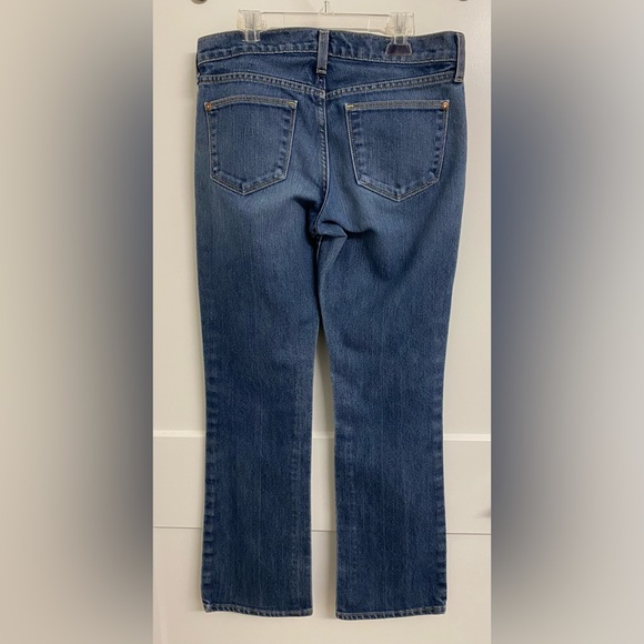 Old Navy Mid Rise-Flirt-Boot Cut Jeans-Medium wash 5 pocket. 4 Short. 29” Inseam - Picture 3 of 4